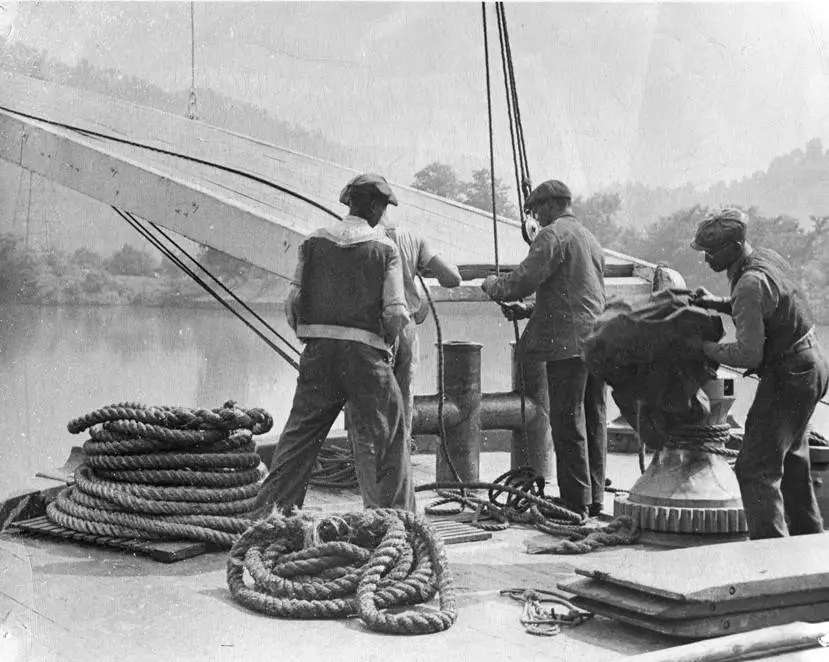 Workers aboard a steamboat